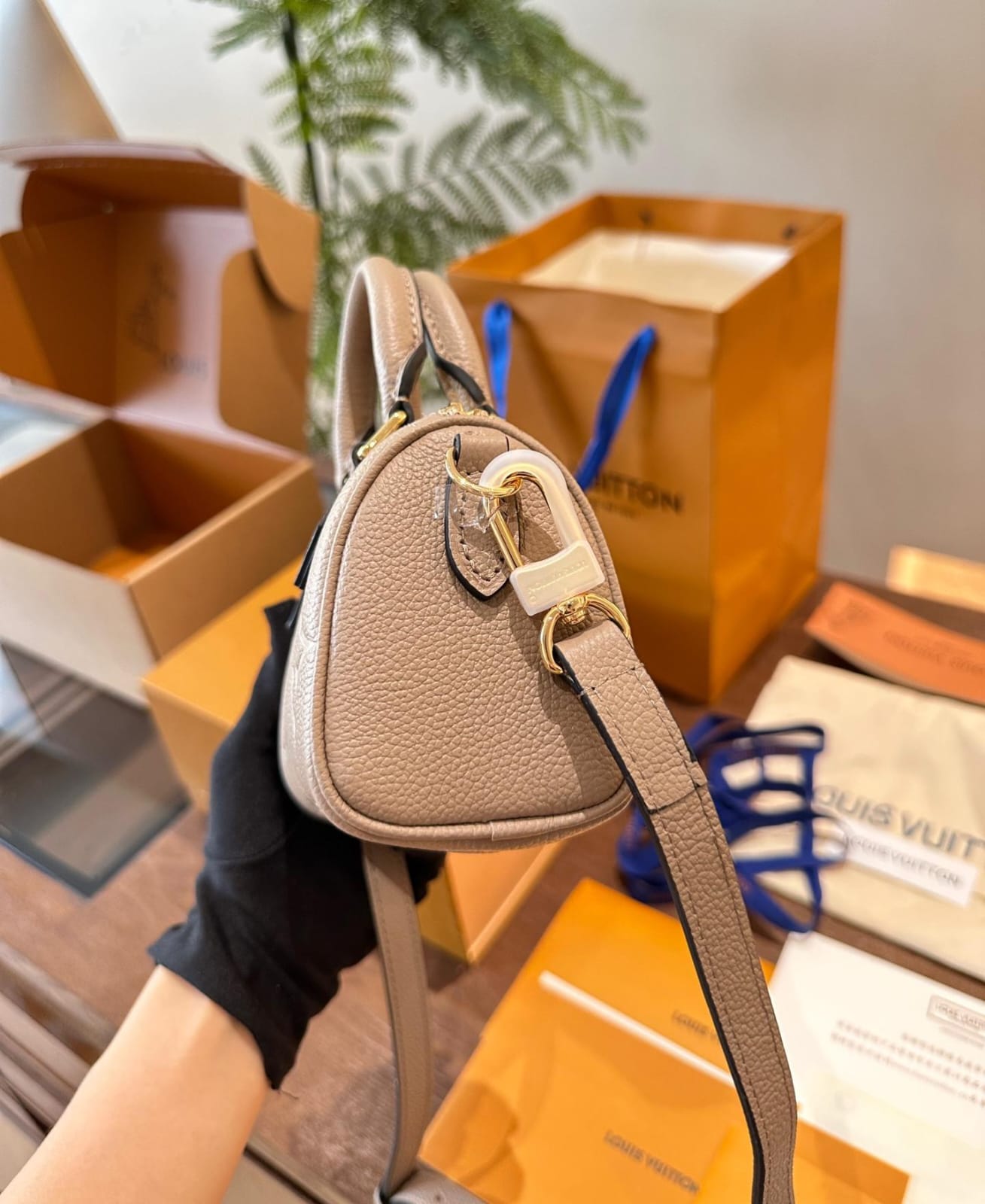 Louis Vuitton Nano Speedy Monogram Empreinte handbag in a tourterelle gray and creaam colour
