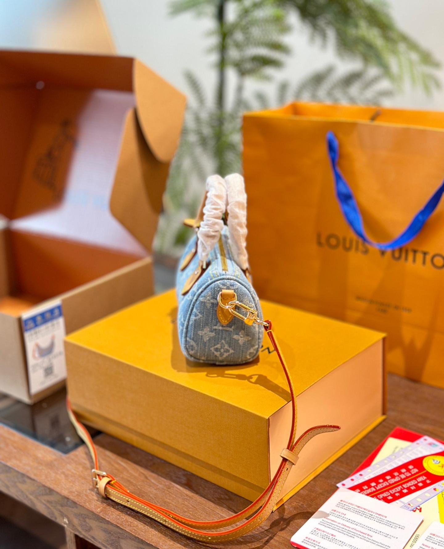 Louis Vuitton Nano Speedy handbag in sky blue Monogram Denim with vachetta leather trim and gold hardware