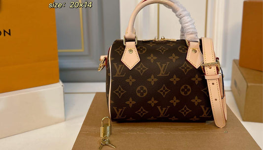 Louis Vuitton Speedy Bandoulière 20 bag in Monogram coated canvas with leather trim (size 20×14)