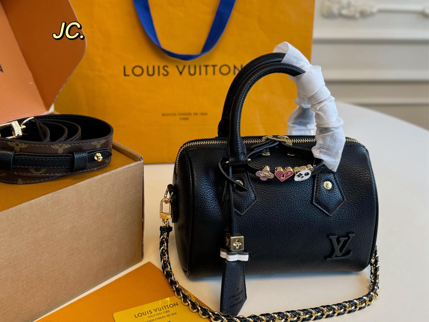 Louis Vuitton Nano Speedy Black Calf Leather handbag (size 20×15)